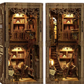 Miniature room book nook with ornate arch frame, tiny bookshelves, ladder, and steps