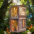 Miniature book nook bookshelf insert kit with ornate doors and warm interior lights