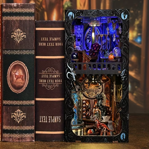 Miniature book nook insert kit with decorative frame and tiny books inside