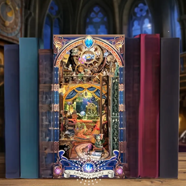 Ornate arched book nook miniature bookshelf insert with blue jewel details and tiny scene