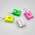 Colorful mini playing-card keychains with metal rings and small deck of cards