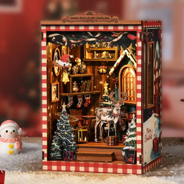 Miniature Christmas book nook kit insert with built-in shelves and holiday decorations