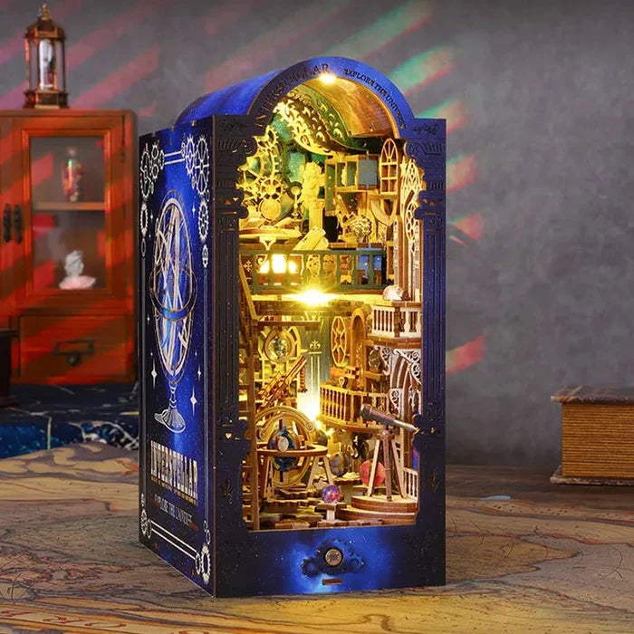 Steampunk observatory book nook insert standing on floor, illuminated interior