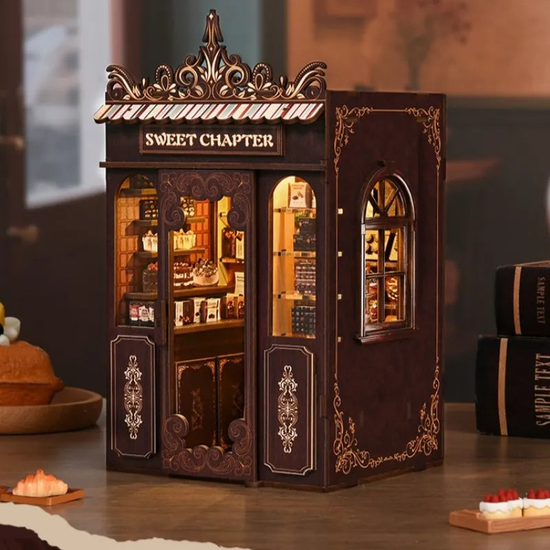 Miniature candy store book nook kit with ornate dark wood doors and window display
