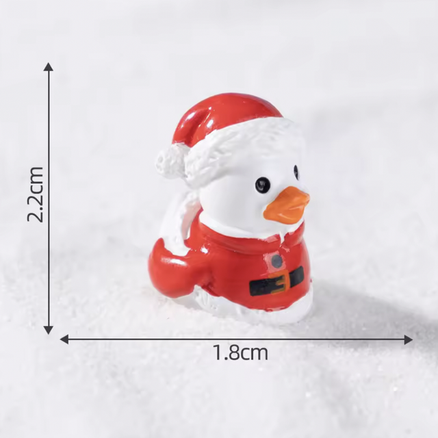 Christmas duck mini figurine in red with white Santa hat and orange beak