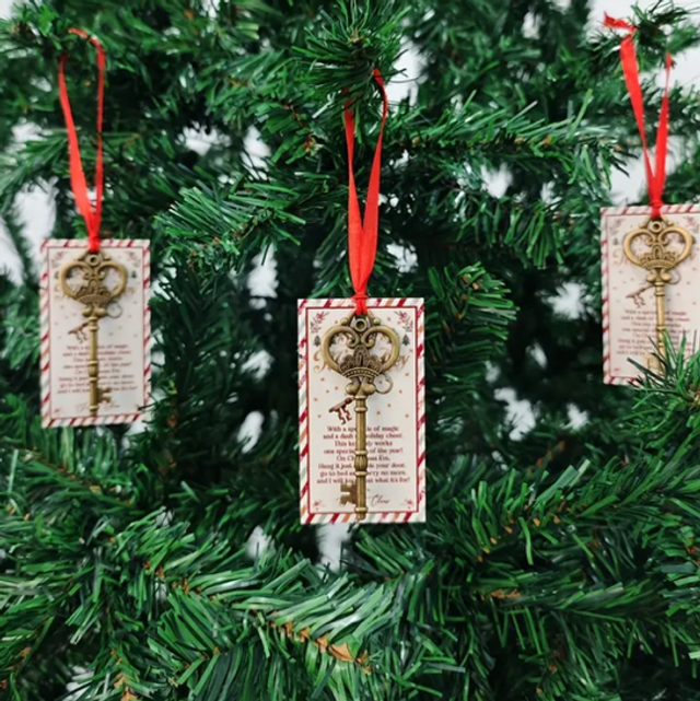 Christmas tree key ornaments with hanging poem card tags, bronze key design and red ribbon