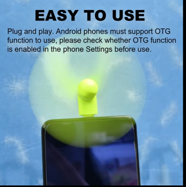 Green mini USB-C phone fan power bank with propeller on top of a phone