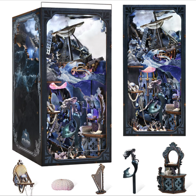 Miniature bookshelf insert kit with framed diorama and included sea-themed accessories