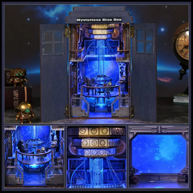 Miniature DIY book nook kit with glowing blue shelves and open front sections