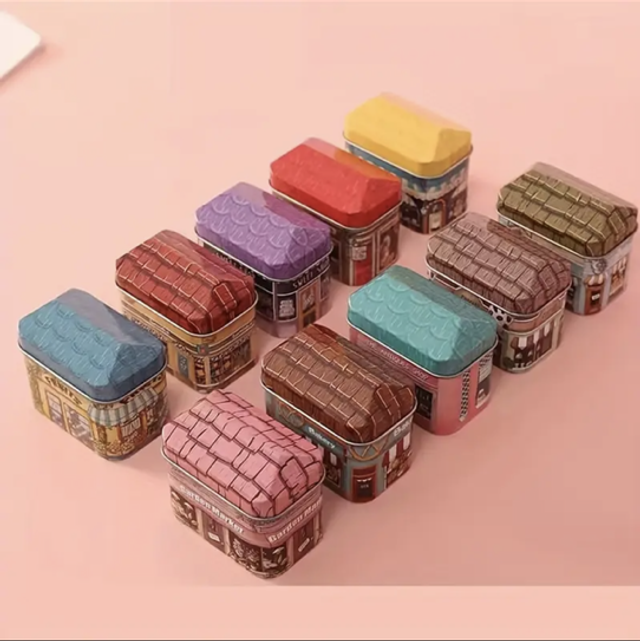 Mini decorative storage tins in red, yellow, teal and brown with quilted lids