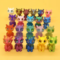 Set of mini dragon figurines, assorted colors with large round eyes