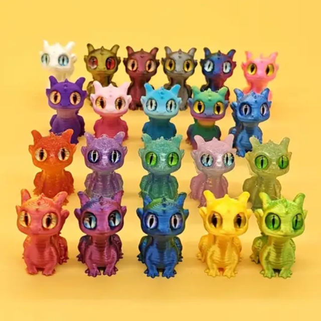 Set of mini dragon figurines, assorted colors with large round eyes
