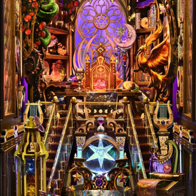 Miniature zodiac fantasy book nook insert with glowing star prism and ornate golden stand