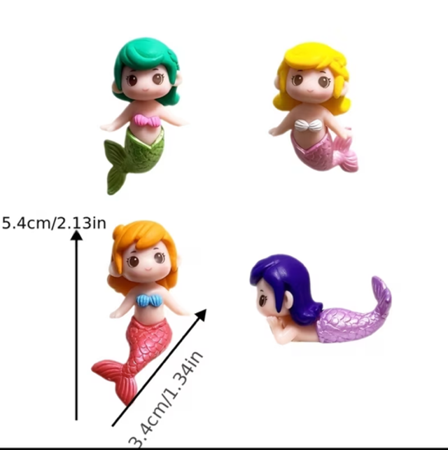 Four mermaid figure dolls with tails in green, yellow, red-orange, and purple