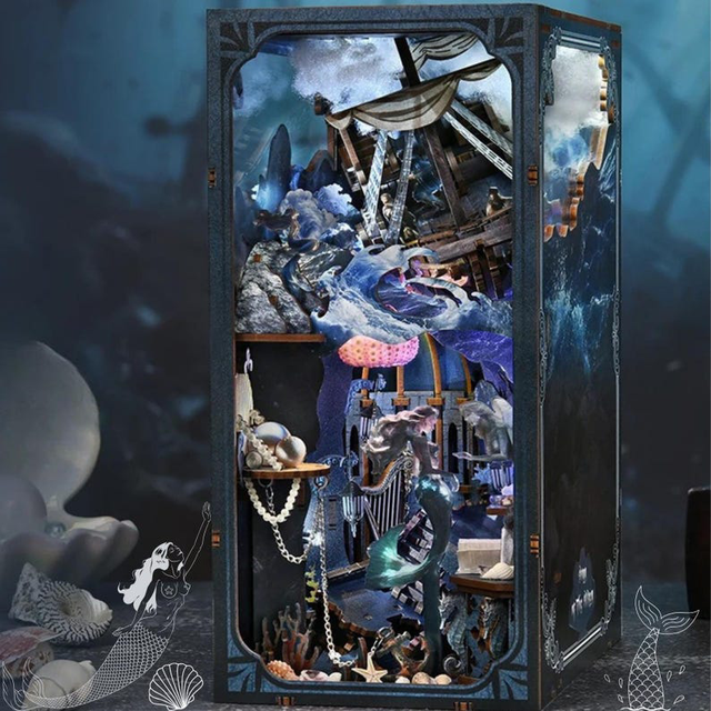 Miniature bookshelf insert kit with ornate dark frame and miniature decorative props
