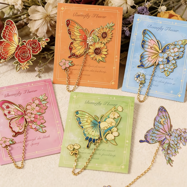 Butterfly metal bookmark with gold chain and butterfly charm, displayed on a greeting card.