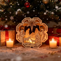 Laser-cut nativity scene panel with octagonal frame, featuring stars and figures