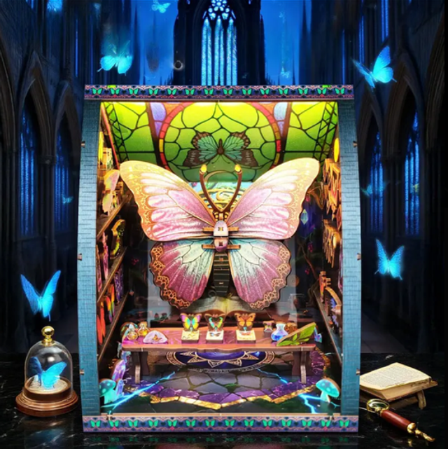 Miniature butterfly bookshelf insert kit with framed open shelf and colorful tiny books