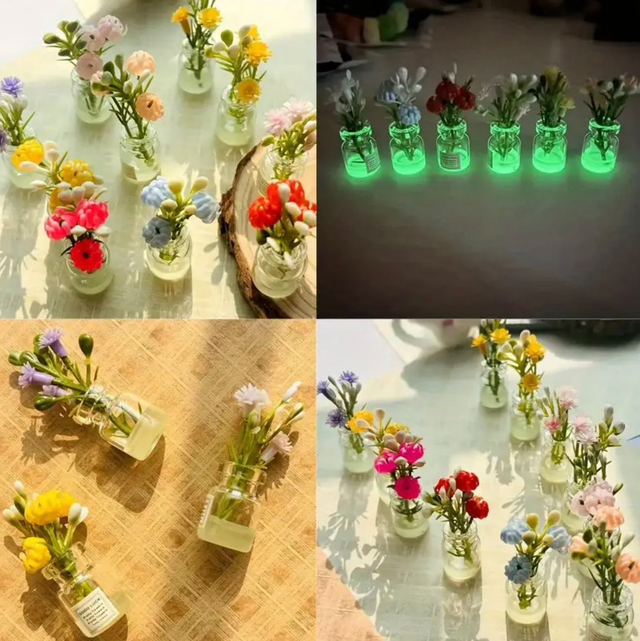Small resin mini flower pots holding mixed pastel artificial flowers