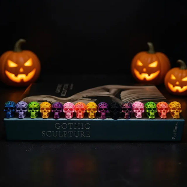 Mini skull figurine set in colorful display box, assorted skull colors