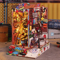 Skate-themed miniature DIY bookshelf insert with colorful shelves and tiny books