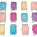 Mini rolling storage container with hard shell and wheels, shown in assorted colors