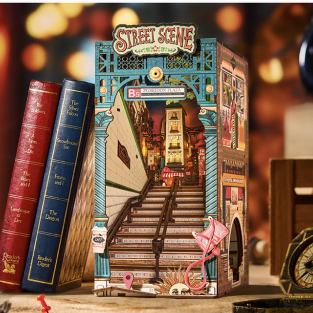 Miniature bookshelf insert kit with miniature street scene diorama and books