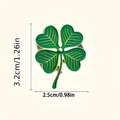 Four-leaf clover pin badge, green enamel with gold-tone outline and pin back