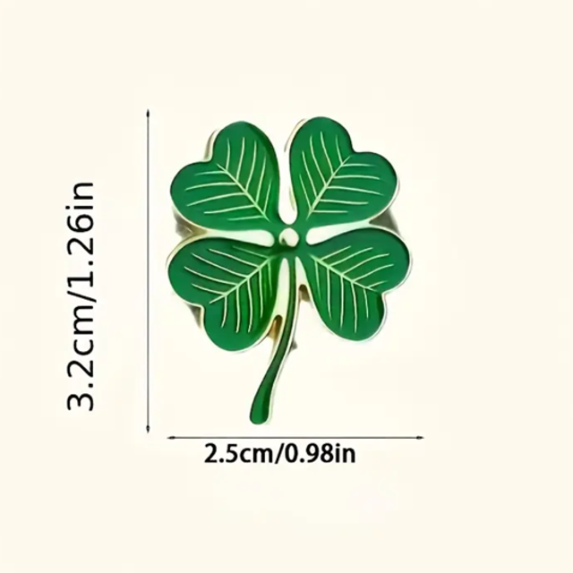 Four-leaf clover pin badge, green enamel with gold-tone outline and pin back