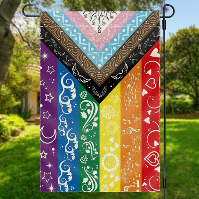 LGBTQ+ pride woven flag with rainbow vertical stripes and decorative symbols, on hanging pole