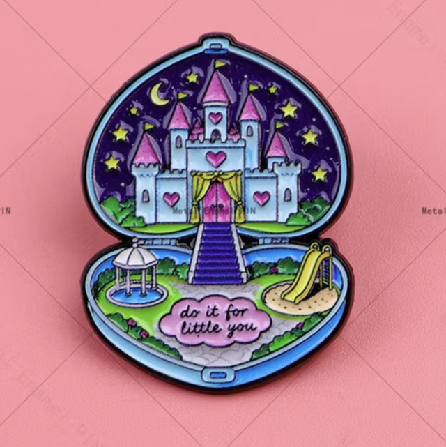 Enamel castle pin badge with stars and 'do it for little you' text