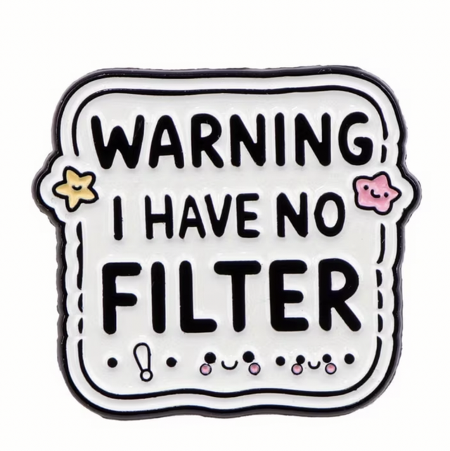 No Filter pin badge, white square with black warning text and small flower icons