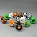 Set of colorful animal fantasy mini figurines, including panda, fox, cat, turtle, and dragon.