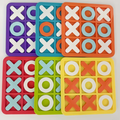 Colorful XO tic tac toe travel game boards with plastic X and O pieces