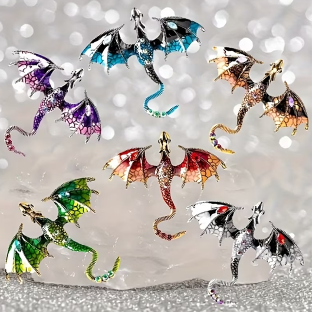 Dragon-shaped enamel pin brooch set with colorful mosaic wings, gold-tone details.