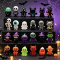 Halloween horror mini figure set with assorted cute monster and ghost designs on display shelf