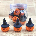 Mini pumpkin hats: three orange pumpkin faces with black pointed tops
