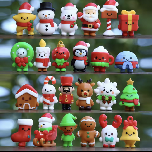 Assorted mini Christmas figures: Santa, snowman, penguin, reindeer, nutcracker, and more